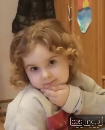 121125