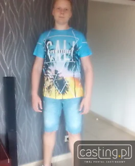 56577